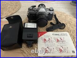 AE-1 35mm Vintage Canon Camera with 50mm Zoom Lens (Untested) See discription