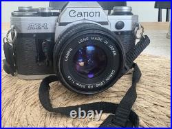 AE-1 35mm Vintage Canon Camera with 50mm Zoom Lens (Untested) See discription