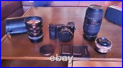 Barely Used Sony Alpha A6000 Digital Camera With 16-50mm and Vintage Lenses