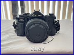 Canon A-1 35mm SLR Film Camera MEGA BUNDLE Lenses, Manuals, Vintage Case, Etc