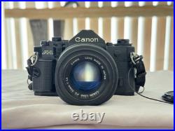 Canon A-1 35mm SLR Film Camera MEGA BUNDLE Lenses, Manuals, Vintage Case, Etc