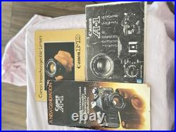 Canon A-1 35mm SLR Film Camera MEGA BUNDLE Lenses, Manuals, Vintage Case, Etc