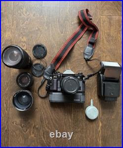 Canon A-1 35mm Vintage SLR Film Camera with Lenses, Case And Accessories TESTED Canon A-1 35mm Vintage SLR Film Camera with Lenses, Case And Accessories TESTED