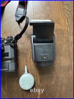 Canon A-1 35mm Vintage SLR Film Camera with Lenses, Case And Accessories TESTED Canon A-1 35mm Vintage SLR Film Camera with Lenses, Case And Accessories TESTED