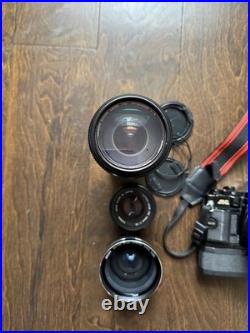 Canon A-1 35mm Vintage SLR Film Camera with Lenses, Case And Accessories TESTED Canon A-1 35mm Vintage SLR Film Camera with Lenses, Case And Accessories TESTED