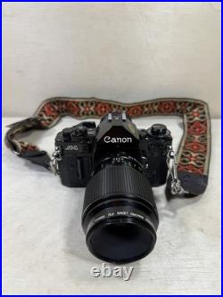Canon A1 35mm SLR Camera With 100mm FD 1 4 with new Battery & Strap Vintage