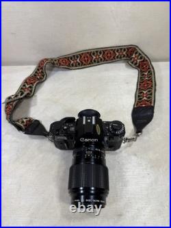 Canon A1 35mm SLR Camera With 100mm FD 1 4 with new Battery & Strap Vintage