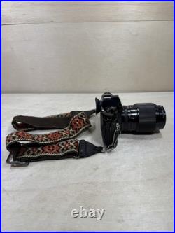 Canon A1 35mm SLR Camera With 100mm FD 1 4 with new Battery & Strap Vintage