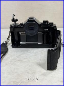 Canon A1 35mm SLR Camera With 100mm FD 1 4 with new Battery & Strap Vintage