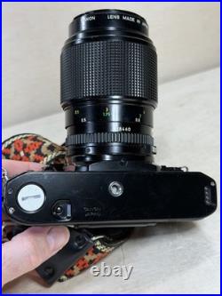 Canon A1 35mm SLR Camera With 100mm FD 1 4 with new Battery & Strap Vintage