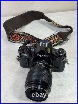 Canon A1 35mm SLR Camera With 100mm FD 1 4 with new Battery & Strap Vintage