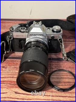 Canon AE-1 35mm SLR Film Camera with 35-135mm f/3.5-4.5 Lens Vintage TESTED WORKS Canon AE-1 35mm SLR Film Camera with 35-135mm f/3.5-4.5 Lens Vintage TESTED WORKS