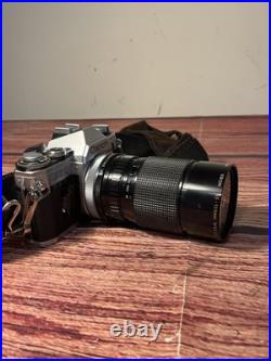Canon AE-1 35mm SLR Film Camera with 35-135mm f/3.5-4.5 Lens Vintage TESTED WORKS Canon AE-1 35mm SLR Film Camera with 35-135mm f/3.5-4.5 Lens Vintage TESTED WORKS