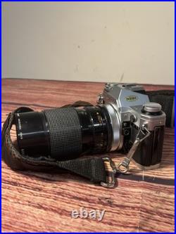 Canon AE-1 35mm SLR Film Camera with 35-135mm f/3.5-4.5 Lens Vintage TESTED WORKS Canon AE-1 35mm SLR Film Camera with 35-135mm f/3.5-4.5 Lens Vintage TESTED WORKS