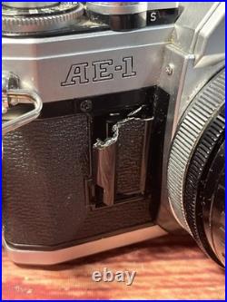 Canon AE-1 35mm SLR Film Camera with 35-135mm f/3.5-4.5 Lens Vintage TESTED WORKS Canon AE-1 35mm SLR Film Camera with 35-135mm f/3.5-4.5 Lens Vintage TESTED WORKS