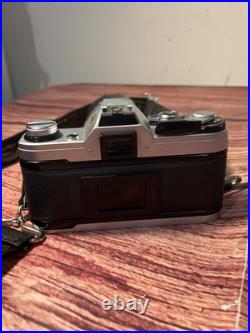 Canon AE-1 35mm SLR Film Camera with 35-135mm f/3.5-4.5 Lens Vintage TESTED WORKS Canon AE-1 35mm SLR Film Camera with 35-135mm f/3.5-4.5 Lens Vintage TESTED WORKS