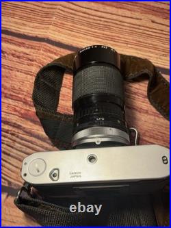 Canon AE-1 35mm SLR Film Camera with 35-135mm f/3.5-4.5 Lens Vintage TESTED WORKS Canon AE-1 35mm SLR Film Camera with 35-135mm f/3.5-4.5 Lens Vintage TESTED WORKS