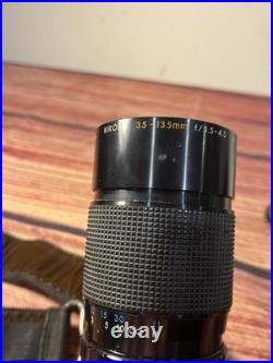 Canon AE-1 35mm SLR Film Camera with 35-135mm f/3.5-4.5 Lens Vintage TESTED WORKS Canon AE-1 35mm SLR Film Camera with 35-135mm f/3.5-4.5 Lens Vintage TESTED WORKS