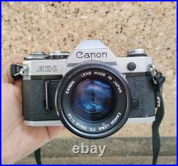Canon AE-1 AE1 35mm SLR Film Camera with Canon 50mm f/1.4 FD Lens