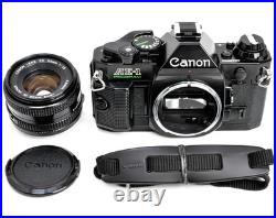 Canon AE-1 AE1 Program Black 35mm Vintage SLR Best Film Camera + 50mm Lens Japan Canon AE-1 AE1 Program Black 35mm Vintage SLR Best Film Camera + 50mm Lens Japan