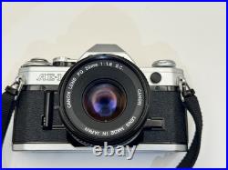 Canon AE-1 Black Silver SLR Camera FD 50mm 11.8 S. C. Lens Vintage Film Tested Canon AE-1 Black Silver SLR Camera FD 50mm 11.8 S. C. Lens Vintage Film Tested