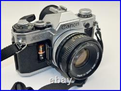Canon AE-1 Black Silver SLR Camera FD 50mm 11.8 S. C. Lens Vintage Film Tested