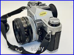 Canon AE-1 Black Silver SLR Camera FD 50mm 11.8 S. C. Lens Vintage Film Tested Canon AE-1 Black Silver SLR Camera FD 50mm 11.8 S. C. Lens Vintage Film Tested