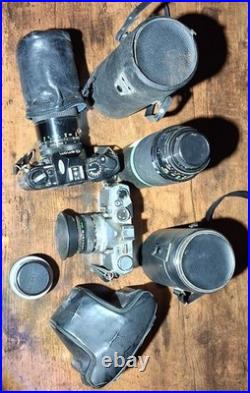Canon AE-1 Black Vintage SLR Camera with Multiple Lenses and Cases