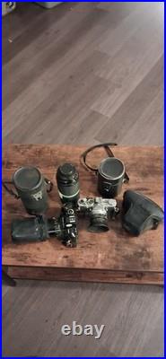 Canon AE-1 Black Vintage SLR Camera with Multiple Lenses and Cases