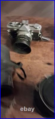 Canon AE-1 Black Vintage SLR Camera with Multiple Lenses and Cases