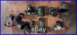 Canon AE-1 Black Vintage SLR Camera with Multiple Lenses and Cases