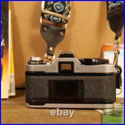 Canon AE-1 Program 35mm SLR Camera w 50mm 1.8 Lens Strap Manuals Vintage Works Canon AE-1 Program 35mm SLR Camera w 50mm 1.8 Lens Strap Manuals Vintage Works