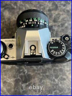 Canon AE-1 Program 35mm SLR Film Camera Vintage FD 28mm 12.8 Lens (No Battery)