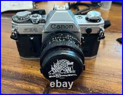 Canon AE-1 Program 35mm SLR Film Camera with 50mm f/1.8 FD Lens Kit Vintage Extras