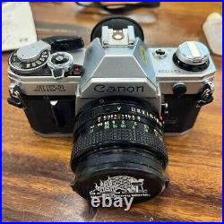 Canon AE-1 Program 35mm SLR Film Camera with 50mm f/1.8 FD Lens Kit Vintage Extras