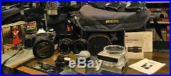 Canon AE-1 Program Camera +3 Lenses (1 Zoom) + Electronic Flash+ 6 Filters +Case