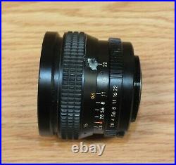 Chinon Ind. Auto 12.8 f=28mm (522703) Vintage Japan Camera Lens Only READ