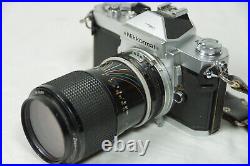 Clean Vintage Nikkormat FT3 SLR with Nikon zoom 4386mm 135 lens film Camera