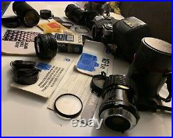 Huge lot of vintage Cameras, Lenses, Cases, Manuals and accessories collection