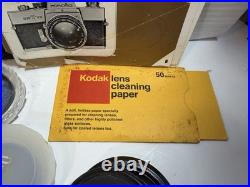 Minolta SRT101 35mm SLR Camera with ROKKOR-PF 55mm Lens And Vintage Suede Case