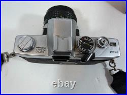 Minolta SRT101 35mm SLR Camera with ROKKOR-PF 55mm Lens And Vintage Suede Case