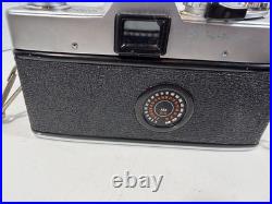 Minolta SRT101 35mm SLR Camera with ROKKOR-PF 55mm Lens And Vintage Suede Case