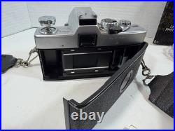 Minolta SRT101 35mm SLR Camera with ROKKOR-PF 55mm Lens And Vintage Suede Case