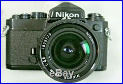 Nikon Fe 35 MM Slr Film Camera With 28 MM 13.5 Nikkor Lens And Extras
