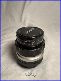 Nikon NIKKOR-O Auto 35mm F2 camera lens vintage No. 727875