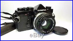 Olympus OM-1 Superb Black SLR Camera with Zuiko 50mm f1.8 Lens Read