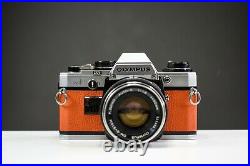 Olympus OM10 35mm Film Camera with 50mm f/1.8 Zuiko Lens & Manual Adapter