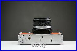 Olympus OM10 35mm Film Camera with 50mm f/1.8 Zuiko Lens & Manual Adapter
