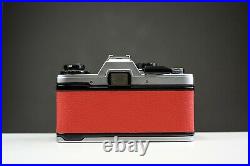 Olympus OM10 35mm Film Camera with 50mm f/1.8 Zuiko Lens Red Leather Serviced