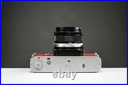 Olympus OM10 35mm Film Camera with 50mm f/1.8 Zuiko Lens Red Leather Serviced